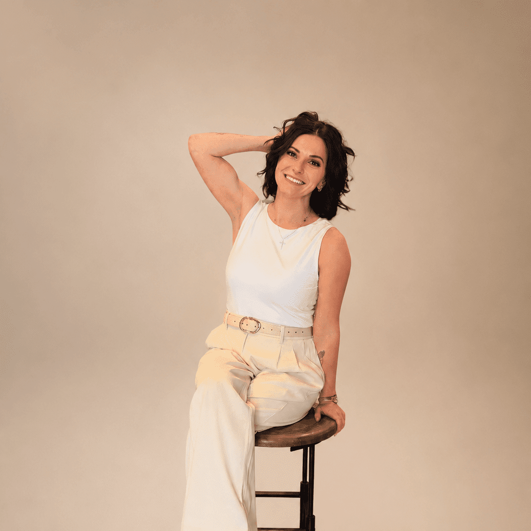 Portrait of Kailah Pereira, a professional stylist at The Maven and The Muse, showcasing their expertise and style.