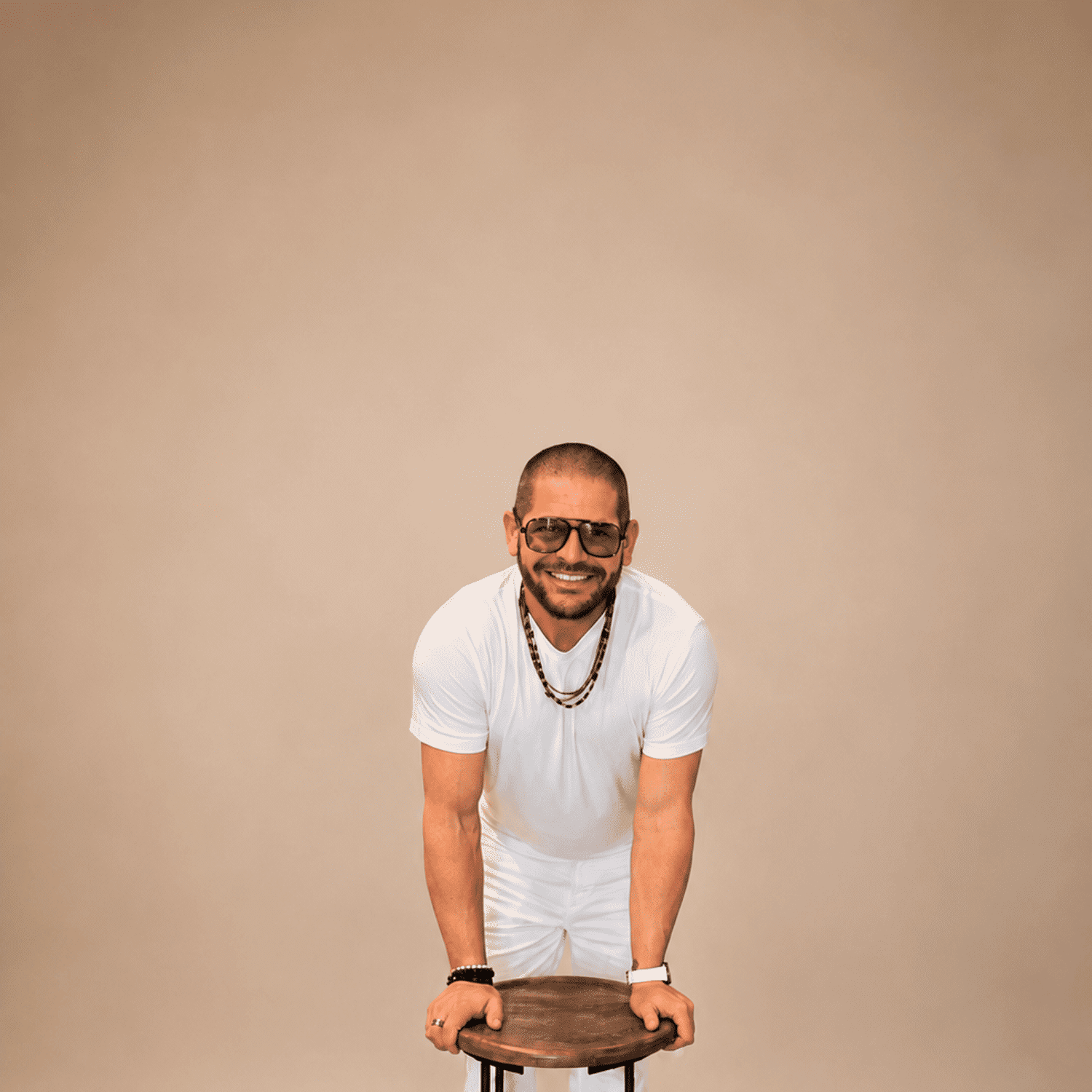 Portrait of David Colonna, a professional stylist at The Maven and The Muse, showcasing their expertise and style.
